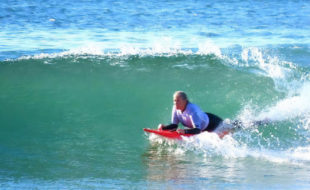 Tracy Mckay (Bluff, KZN) on the wave of the day with a 9-point ride in the Prone Women Unassist Division. Photo: Jason Brown
