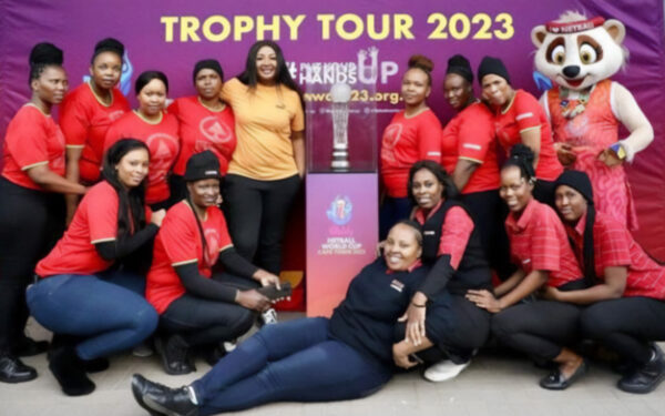 President of Netball South Africa, Cecilia Molokwane and Netball SA mascot, Letsatsi along with Spar employees from Ladysmith with the 2023 Vitality Netball World Cup Trophy. Photo: KZN Netball