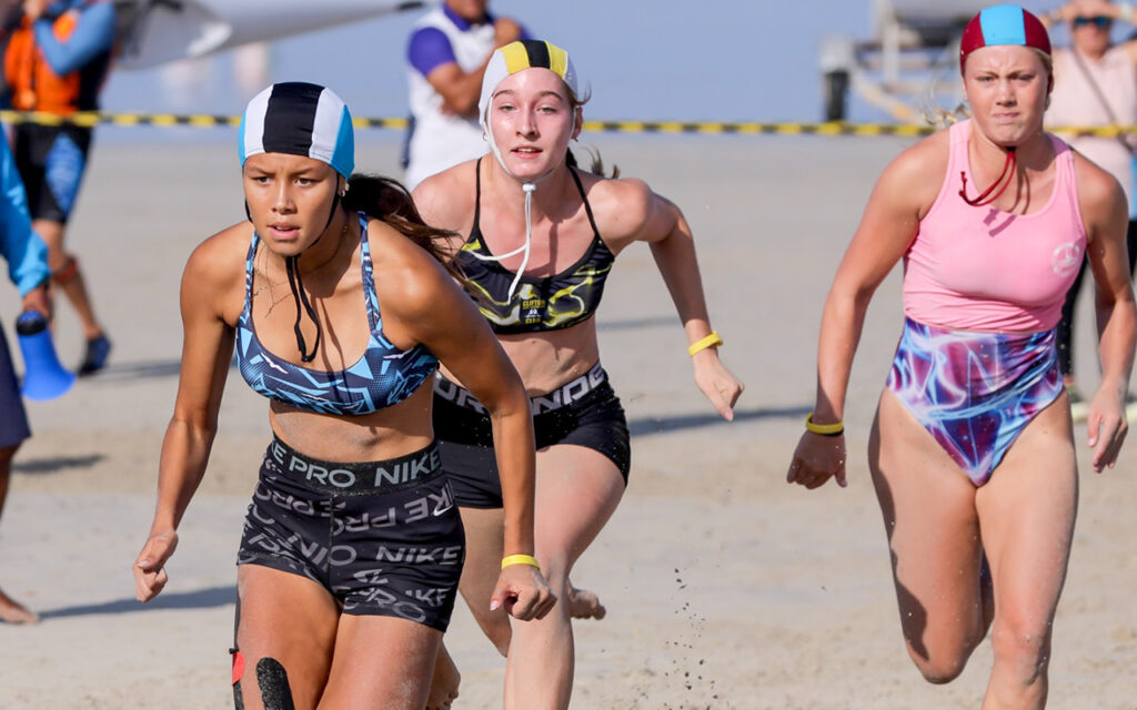 Eve Abrahams (left) won the U17 Beach Flags, followed by Ella Dorington Clifton and Erin Burke. Photo: Halden Krog