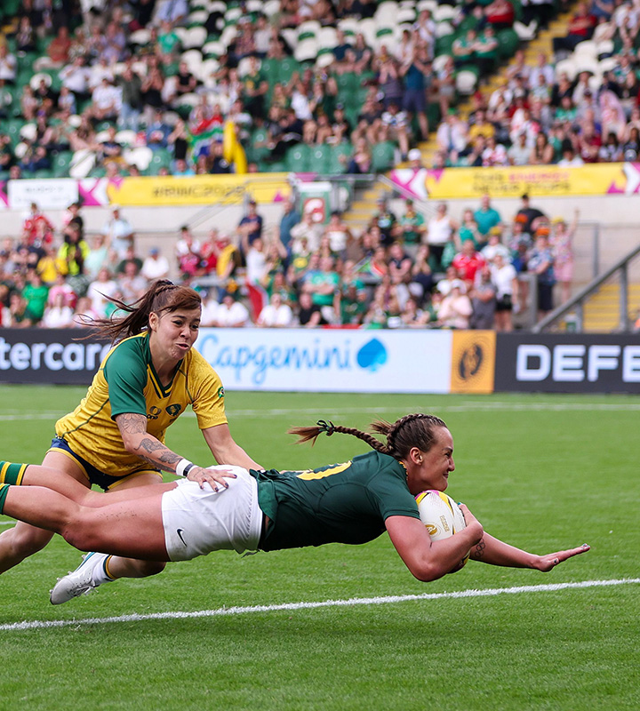 Libbie Janse van Rensburg pictured diving over the line to score South Africa’s seventh of ten tries in the 66-6 thumping.