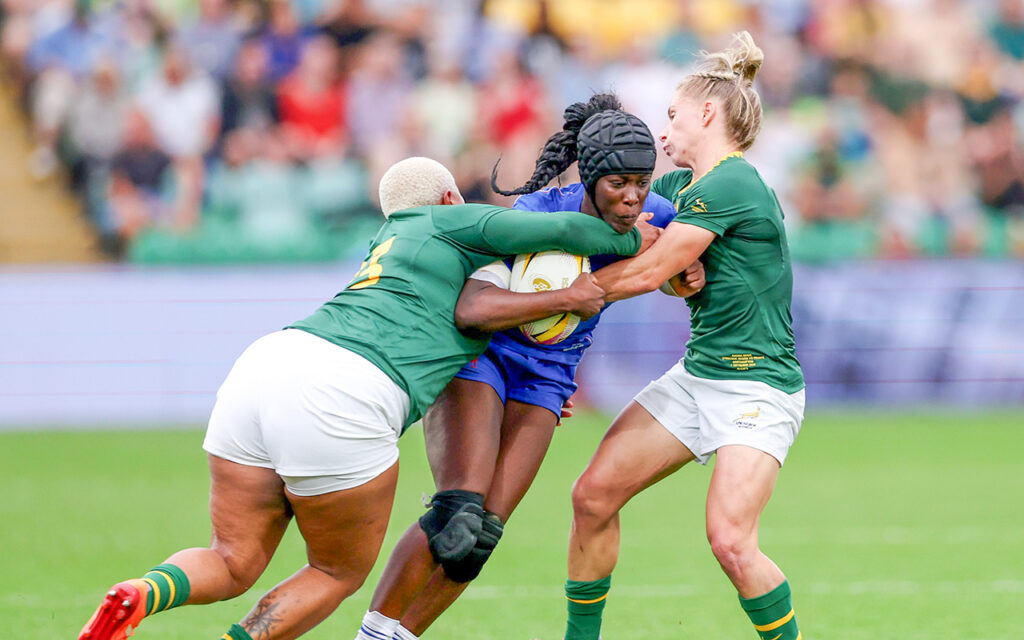 France’s Nassira Konde of France is tackled by Vainah Ubisi and Nadine Roos during the Women's Rugby World Cup 2025 Pool D match in Northampton, England, on 7 September, 2025. Photo: Morgan Harlow - World Rugby/World Rugby via Getty Images