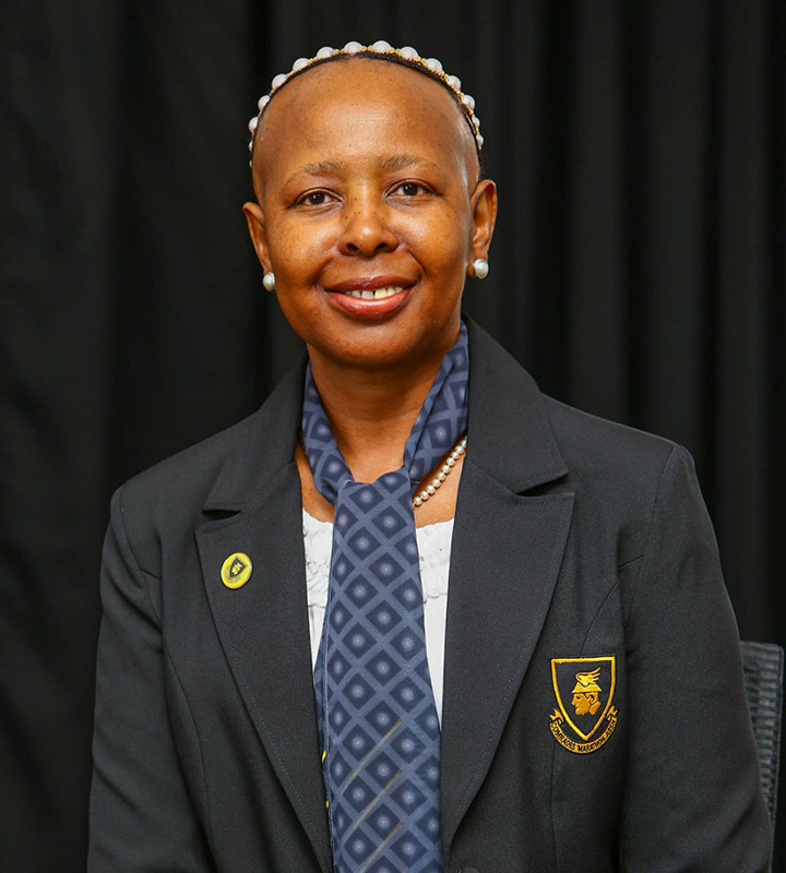 In her personal time, the Comrades Board member mentors young athletes and raises funds for essential items, including shoes, sports bras, and sanitary pads. Photo: Supplied