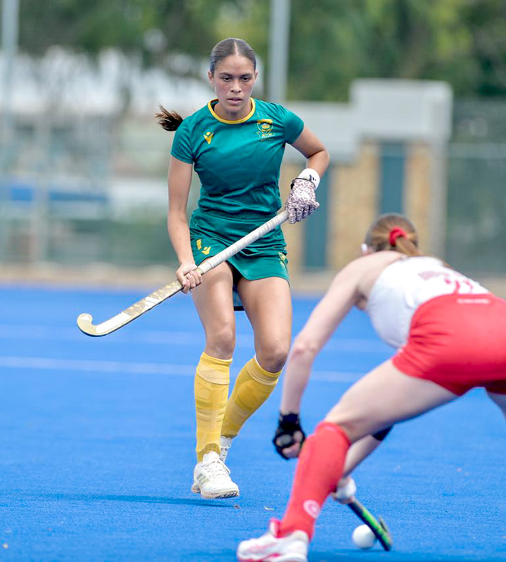 Taheera Augousti vigilant as the dangerous Canadian field hockey team prepares to launch another assault during the evenly-matched international Test series.