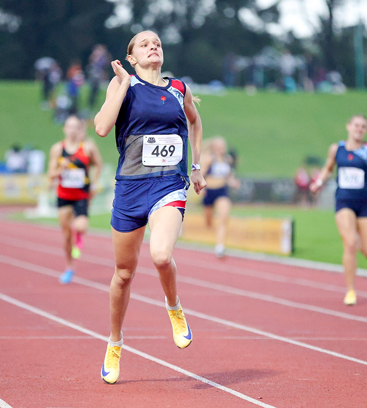 Christi Loggenberg (pictured) and Janelle Kirkpatrick also rewrote the record books on Day 2 of the ASA Age Group Champs.