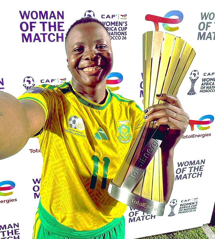 All smiles behind the lens, Kgatlana shows off the Woman of the Match trophy her match-winning strike so richly earned. Photo: CAF