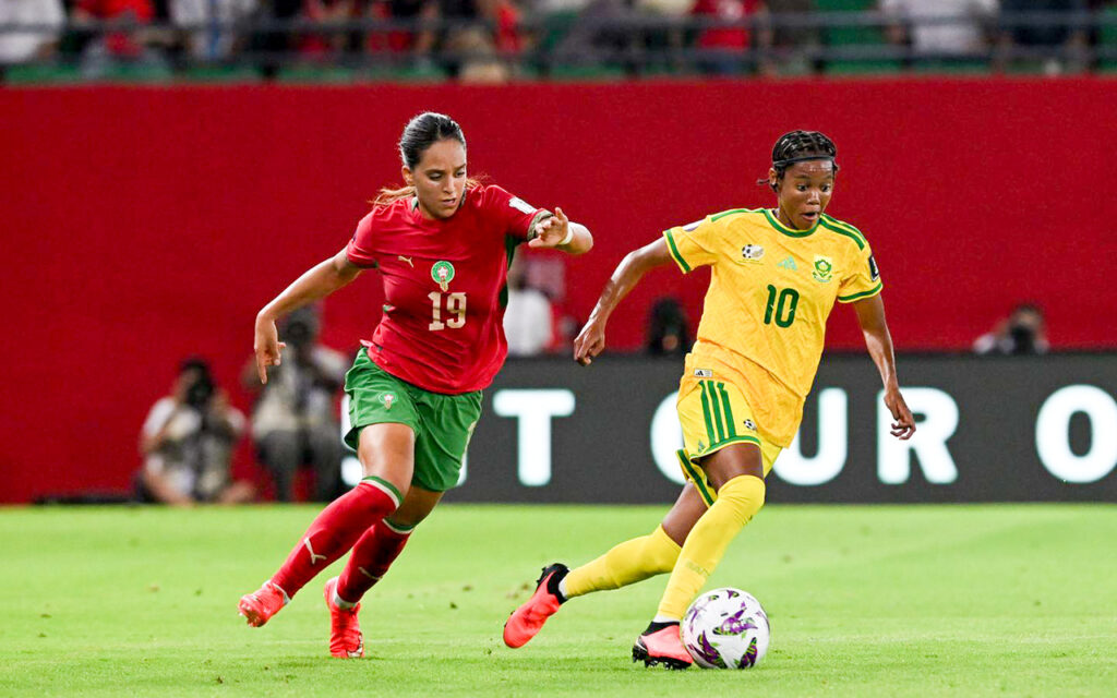The Atlas Lionesses forward Najat Badri eyes the ball at the feet of Banyana Banyana no. 10 Linda Motlhalo, during their quarter-final at the Moulay El Hassan Stadium in Rabat, Morocco, on Saturday, 8 August 2026. Photo: SAFA