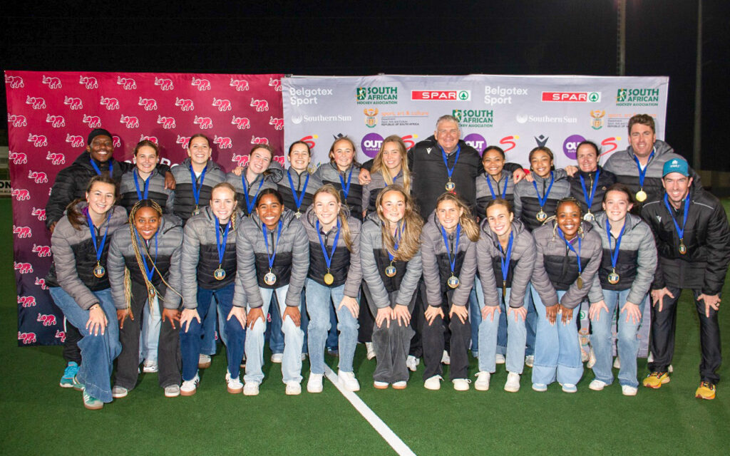 North West celebrate with the trophy after being crowned 2026 SA Hockey U21 IPT women's champions, holding their nerve to win the shootout 1-0 after the teams were tied 1-all at full time, to add the 2026 title to the crown they lifted in 2024 at the KC March Astro in Gelvandale, Gqeberha, on Friday, 14 August, 2026. Photo: MOB ENT Photography