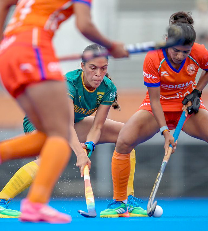 Taheera Augousti keeps an intense pressure on the Indian possession during her 50th cap for South Africa.