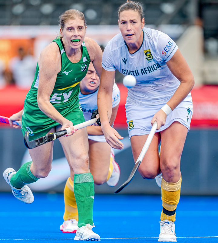 Stephanie Botha and her Ireland counterpart race to chase down possession of the ball during their final World Cup encounter.