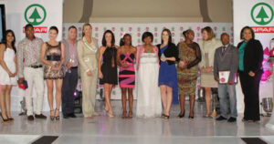 Ravele (fourth from right) enjoys a lighter moment with SA Olympic and Paralympic heroine, Natalie du Toit, as all winners unveiled at the 2012 SPAR gsport Awards are asked to return to the stage at the conclusion of the Awards. Pictured are (from left) Personal Account Writer Award winner, Chervon Chetty; 2012 SPAR Athlete of the Year winner, Caster Semenya; 2012 Style Star winner, Lalla Hirayama; inaugural SPAR Recognition Award recipient, Bruce Davidson; 2012 Coach of the Year, Elize Kotze; 2012 Woman of the Year winner, Venessa Clack; 2012 Up and Coming Athlete Award winner, Thato Makhafola; inaugural gsport Hall of Famer, Penny Heyns; 2012 Volunteer of the Year Award winner, Anela Mahamba; 2012 Woman in Media, Tarryn Steenekamp; 2012 Hall of Fame inductee; Muditambi Ravele;  2012 Athlete of the Year with a Disability, Natalie du Toit; 2012 Sponsor of the Year, SASOL representative Dumisani Mbokane; and Sports Federation of the Year winner, SA Hockey Association CEO, Marissa Langeni; pictured at the Wanderers Club, in Illovo, Johannesburg, on Tuesday, 20 November, 2012. Photo: Reg Caldecott/gsport4girls