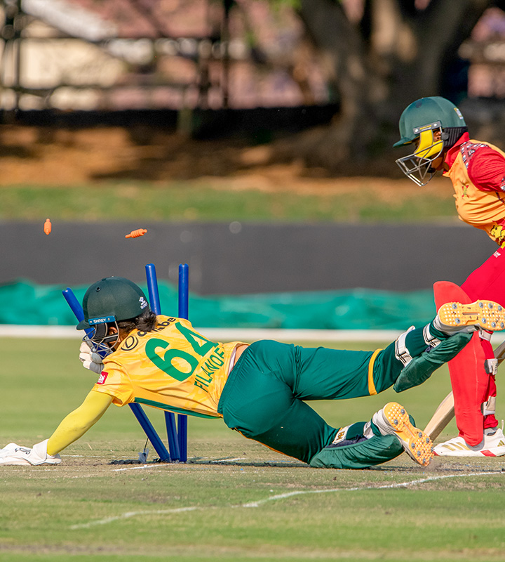 Jae-Leigh Filander kept wicket on debut and combined with Kayla Reyneke for a run-out that ended a Zimbabwe fourth-wicket stand.