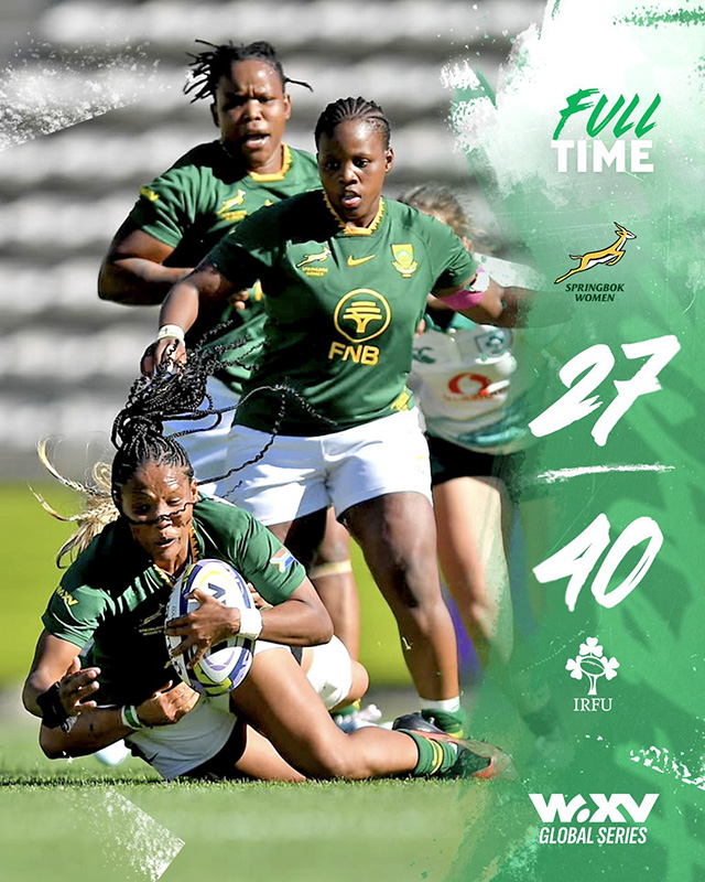 Springbok Women full-time score graphic from the WXV Global Series Test against Ireland, showing a final score of Springbok Women 27, Ireland 40. In the action photograph on the left, a Springbok Women player in the green national jersey dives forward with the ball held in both arms as she is tackled low, while two team-mates in green jerseys and white shorts run in support behind her and an Ireland player in a white jersey follows on the right. Blurred stadium seating fills the background. On the right, against a green and white brushstroke panel, the words Full Time appear at the top, followed by the Springbok Women emblem, the score 27 above 40, the IRFU crest and the WXV Global Series logo at the bottom.